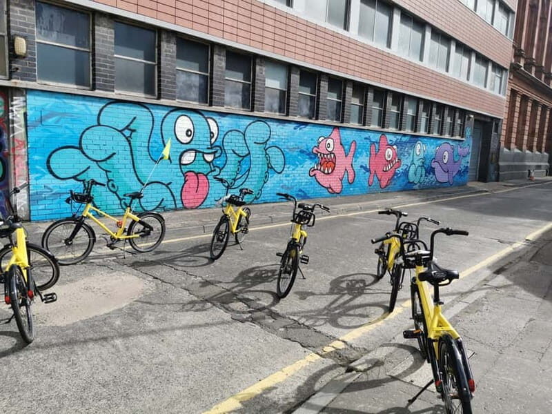 Belfast: City Highlights Bike Tour - Cathedral Quarter streets: murals and stories in walking-distance color