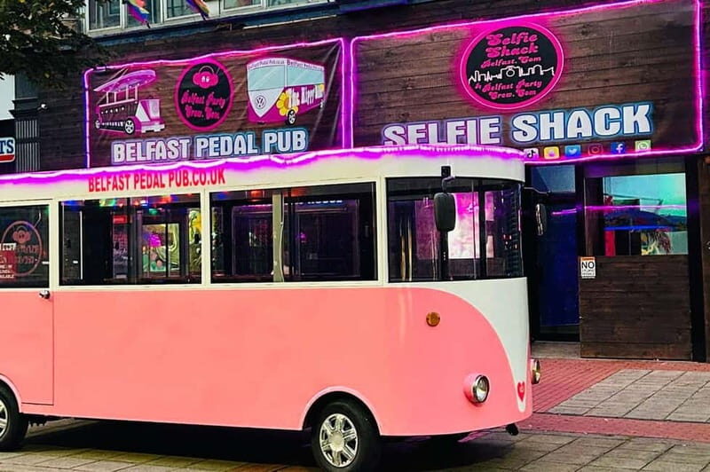 Belfast: Fully Enclosed Pink Party Bike Ride - The Pink Hippy Bike: Built to Keep the Weather From Ruining the Party