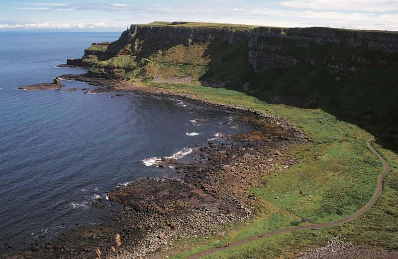 Belfast Giant's Causeway and Titanic Distillery Whiskey Tour - Dunluce Castle cliff views: where the coast steals the show