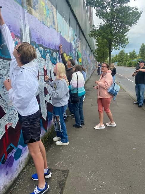Belfast: Peacewall and Political History Black Taxi Cab Tour - The guides are the real value: balanced, personal, and question-friendly