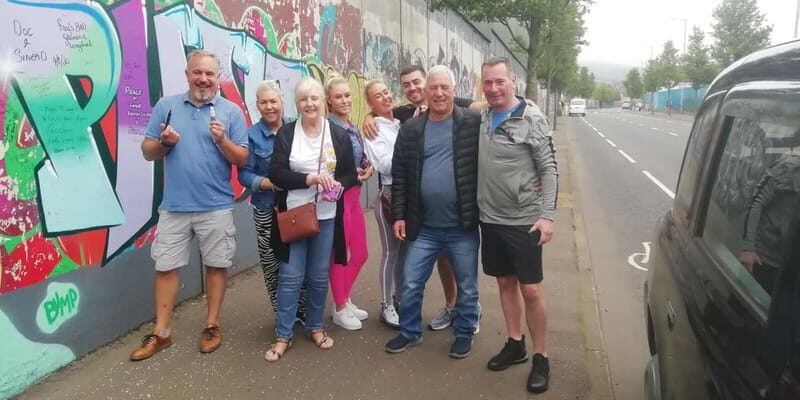 Belfast: Political Mural Taxi Tour - Stop 2: Falls Road murals and a careful photo stop