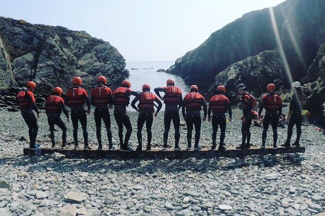 Coasteering on Anglesey - Walking the coast route: rock pools, geology, and cave time