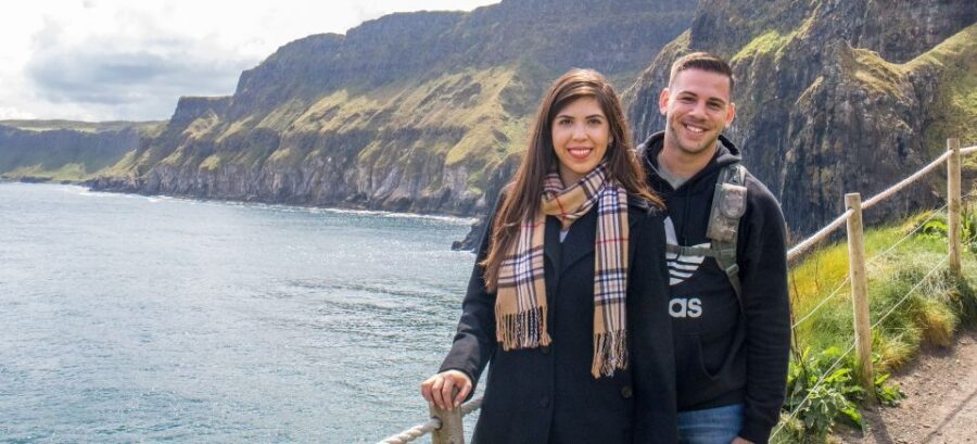 Dublin: Giants Causeway, Dark Hedges, Dunluce & Belfast Tour - Dunluce Castle ruins: quick photo stop, big cliffside mood