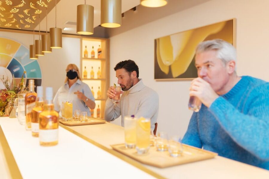East Lothian: Glenkinchie Whisky Distillery Tour and Tasting - Entering the working distillery world, not a quiet showroom