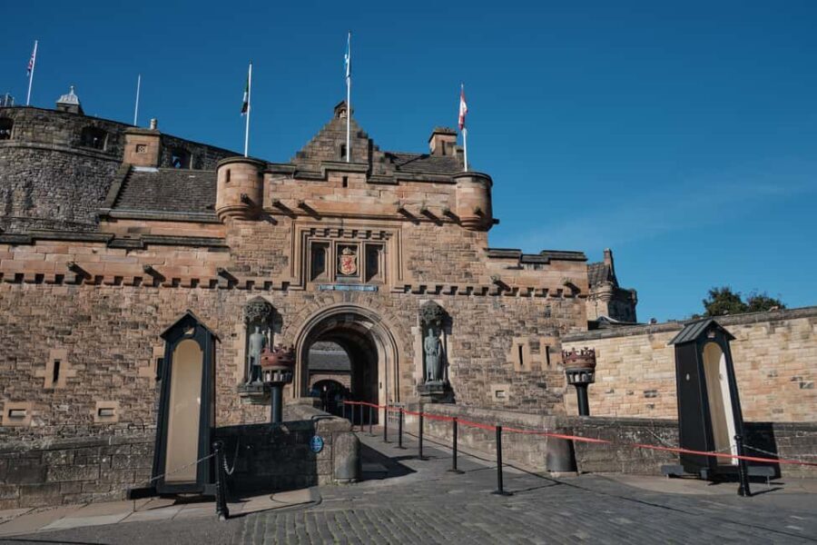 Edinburgh: Castle Guided Tour & Holyrood Palace Ticket - The guided Edinburgh Castle walk: sieges, prisons, and the Great Hall you’ll remember