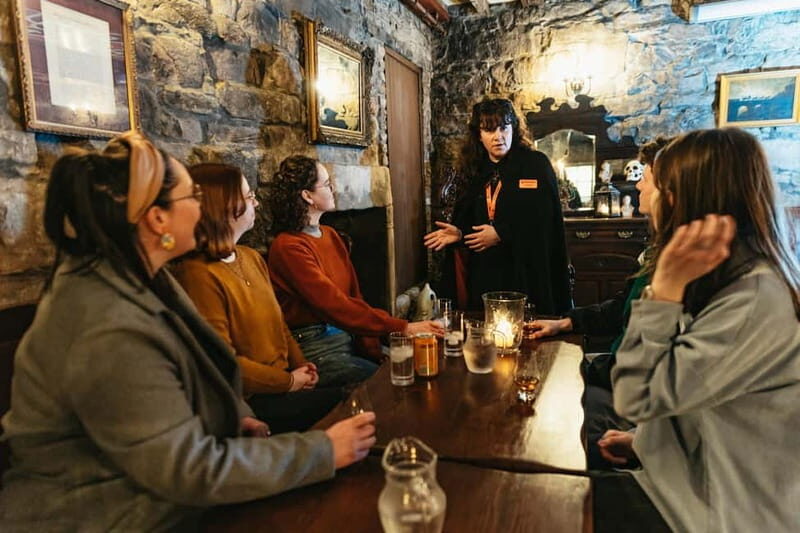 Edinburgh: Underground Vaults Evening Ghost Tour with Whisky - Start at Mercat Cross: setting the mood on the Royal Mile