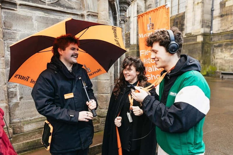 Edinburgh: Underground Vaults Evening Ghost Tour with Whisky - The Old Town walk: story pace before you go underground