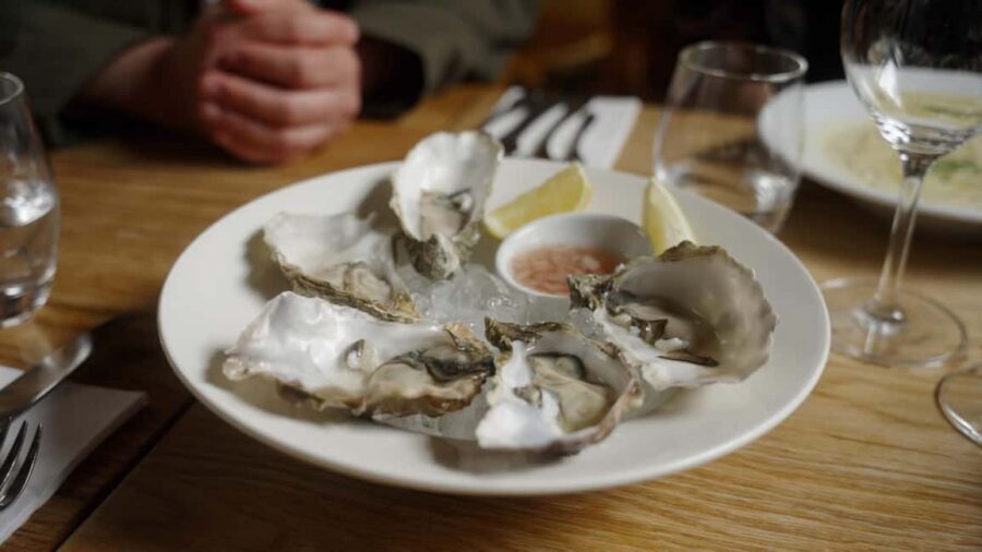 Edinburgh: VIP Food Tour at a Secret, Traditional Restaurant - The food lineup: oyster, Cullen skink, haggis, seafood delights, and dessert