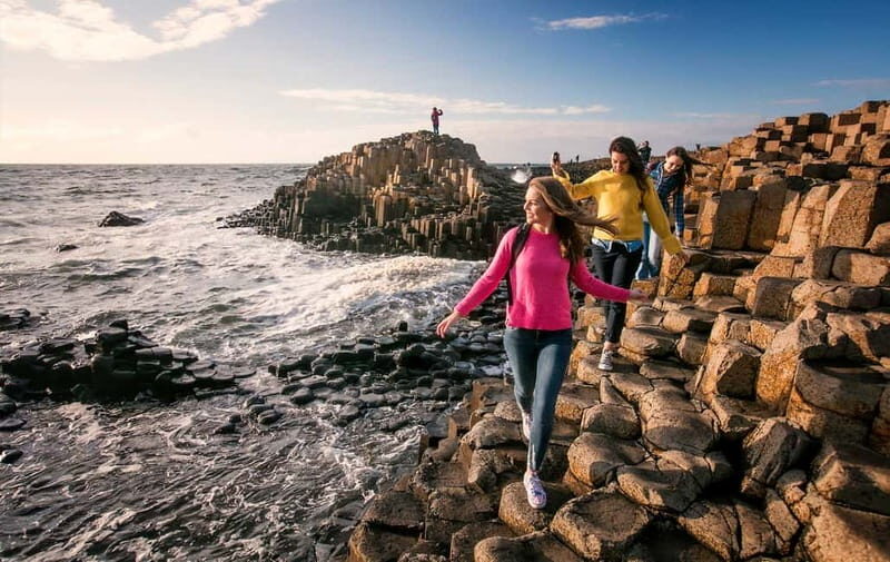 From Belfast: Full-Day Giants Causeway Land and Boat Tour - Ballycastle lunch break: fuel plus a real town stop