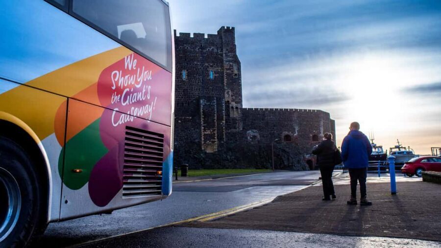 From Belfast: Giant's Causeway & Castles Guided Tour - Coach window scenery: Ballygalley, Glenarm Castle, Carnlough Harbour, Waterfoot