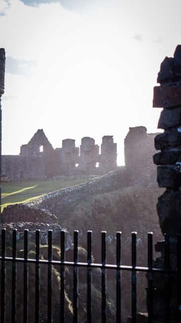 From Belfast: Giant's Causeway & Castles Guided Tour - Carrick-a-Rede Rope Bridge viewpoint: stunning cliffs without the queue