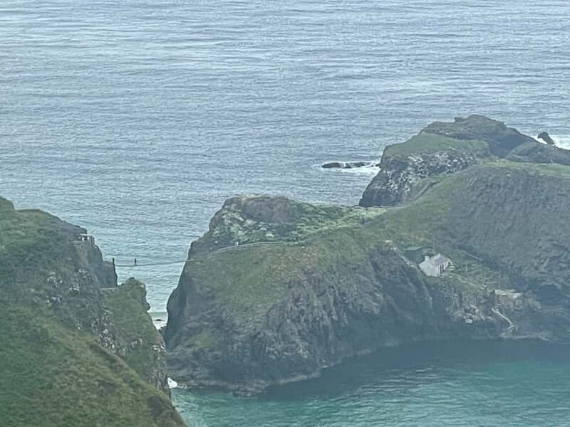 From Belfast: Private Giants Causeway Coastal Tour - Dunseverick Castle Ruins: A Cliffside Pause Before the Main Show