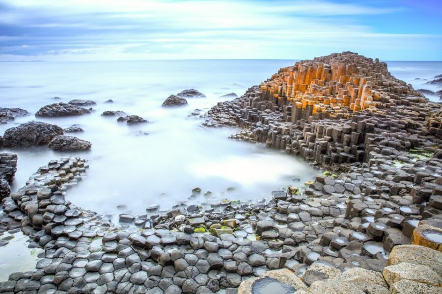 From Dublin: Giant's Causeway & Belfast Titanic with Ticket - Dunluce Castle Photo Stop: The 13th-Century Ruin Moment