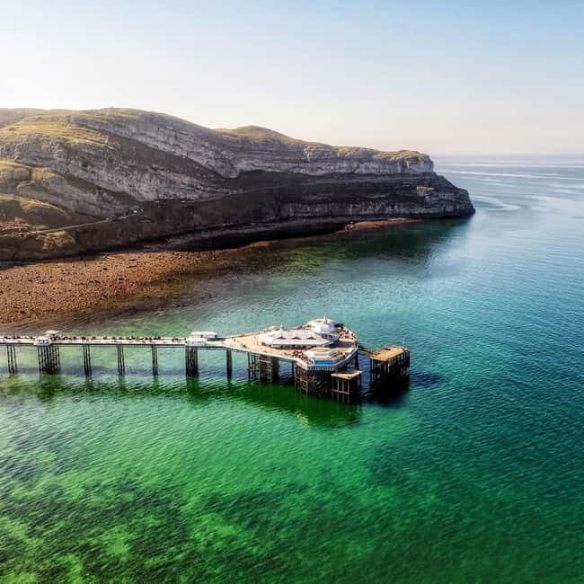 From Llandudno: Portmeirion, Snowdonia and Castles Tour - From Llandudno to Great Orme Road: start with cliffs and fast sea views