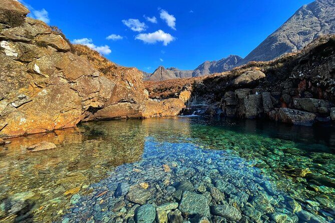 Isle of Skye and Fairy Pools Day Tour leaving from Portree - Sligachan Old Bridge: Folklore, Mountain Ridge Views, and Fast Photo Angles