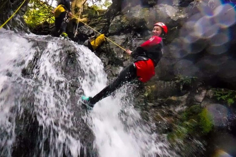 Keswick: Canyoning Adventure - Gear up right: wetsuit, helmet, and laced footwear
