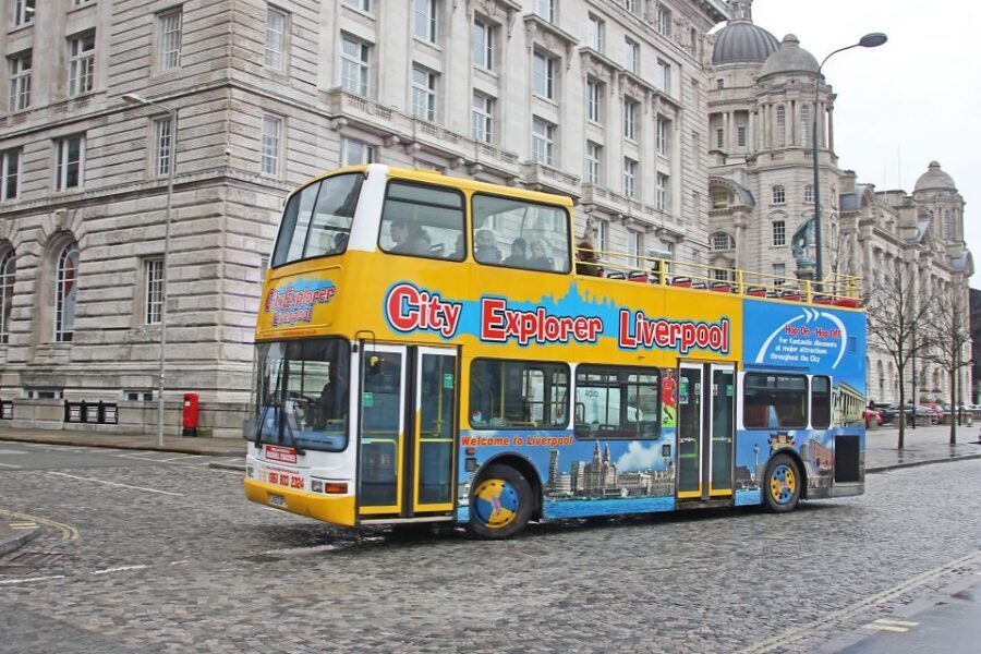 Liverpool: Beatles Explorer Bus Tour Ticket - Penny Lane and Strawberry Field gate: your two must-hit photo stops
