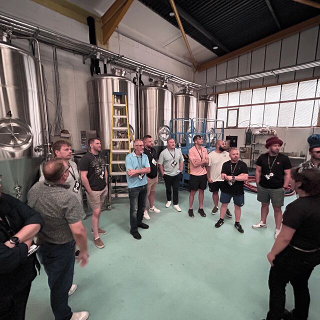 Liverpool: Brewery Bus Tour with 12 Beer and Pizza - The brewery circuit: four stops, tasting windows, and behind-the-scenes looks