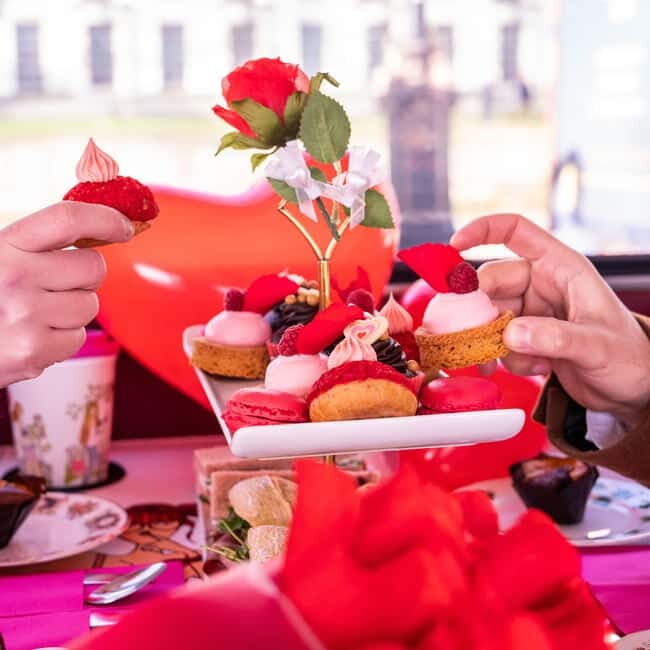 London: Afternoon Tea Sightseeing Bus Tour - St James’s Park and Hyde Park: Green Space Between Stone Icons