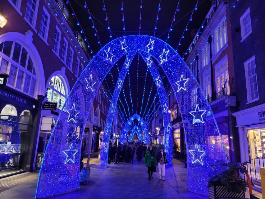 London: Private Christmas Lights and Markets Walking Tour - Strand and Trafalgar Square: lights with landmark context