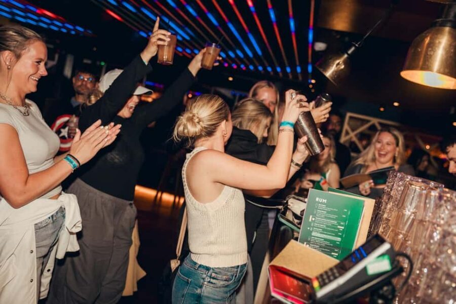 Manchester: Guided Bar Crawl with Shots and Nightclub Entry - The First Hour: Ice Breakers, a Welcome Shot, and Instant Group Vibes