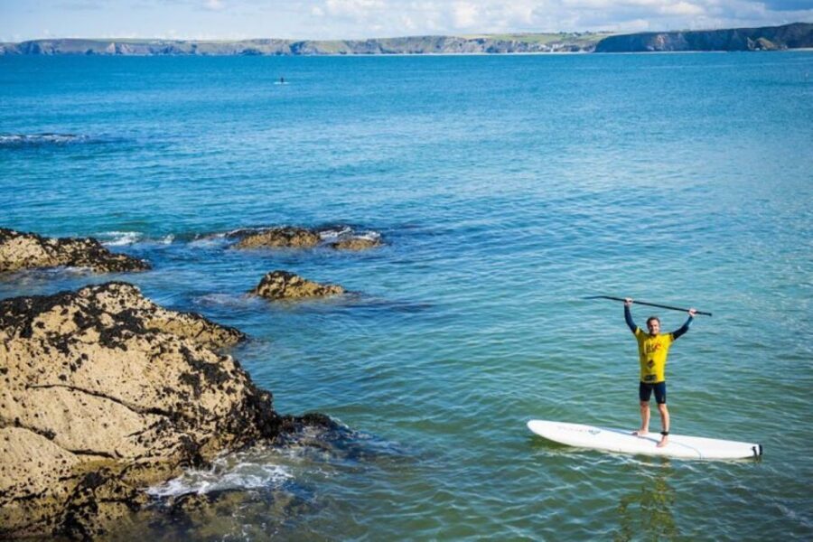 Newquay: Paddleboarding Lesson & Tour - Starting at the Towan Beach Facility: Kit, Warmup, and Storage
