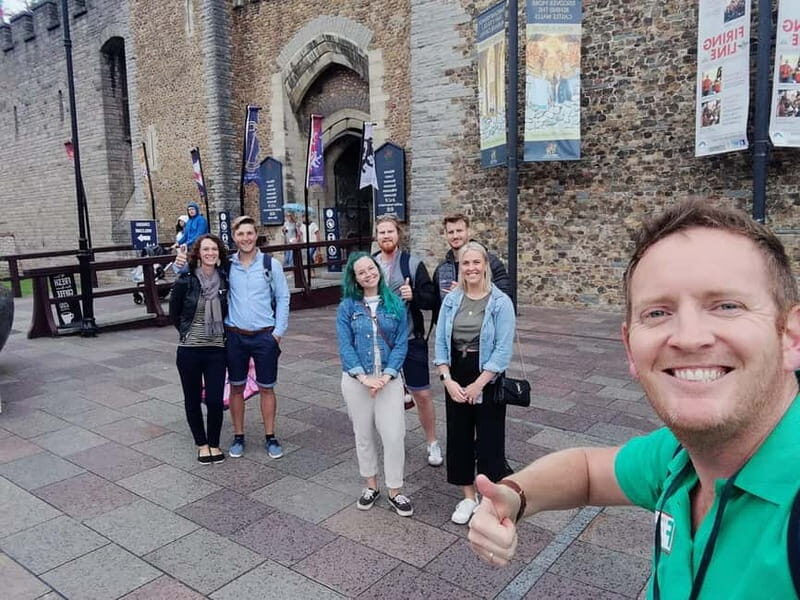 The Dark Cardiff Guided Walking Tour - Starting on The Hayes: John Batchelor statue, green umbrella, easy meetup
