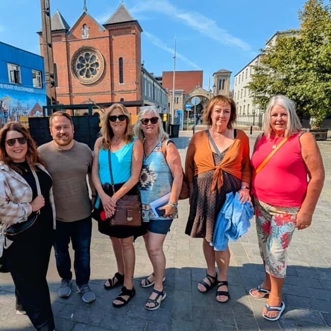 The Story of Belfast: walking tour with a local guide - Europa Hotel, Crown Liquor Saloon, and Ulster Hall: where stories meet public life