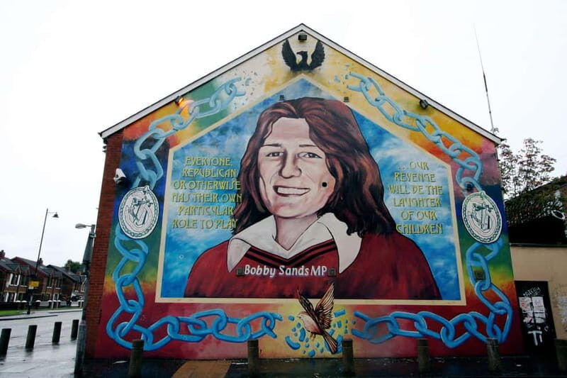 The Troubles Tour -Two Stories, One Journey - Starting in West Belfast at the red-and-white 20-story landmark