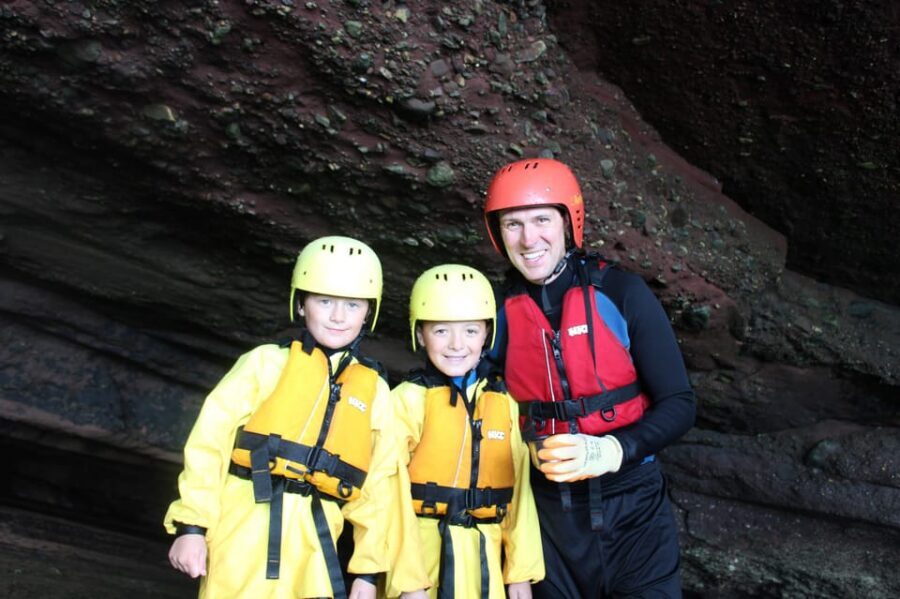 Torquay: Coasteering 5<em> Geopark Tour in Torquay – Key points at a glance’ /></p>
<ul>
<li><strong>UNESCO Geopark coastline made understandable:</strong> you’ll hear why these rocks and formations matter while you’re actually on them</li>
<li><strong>Safety first, fun second (in a good way):</strong> clear briefing and route choices based on comfort level</li>
<li><strong>Maidencombe’s real playground:</strong> caves, rocky ledges, sea channels, and clear water along the way</li>
<li><strong>All the wetsuit gear is provided:</strong> wetsuits, helmets, buoyancy aid, gloves, and old shorts included</li>
<li><strong>Photos included:</strong> complimentary images mean you can focus on the moment, not the camera</li>
<li><strong>Easy and challenging routes:</strong> you’ll have options if you want a gentler start or more of a scramble</li>
</ul>
<h2 id="why-coasteering-in-torquay-feels-different-in-the-unesco-geopark">Why coasteering in Torquay feels different in the UNESCO Geopark</h2>
<p><img width="900" height="599" decoding="async" src=