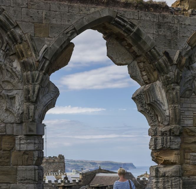 Whitby: Whitby Abbey Ticket - Entering the abbey grounds: ruins, seats, and time to just look